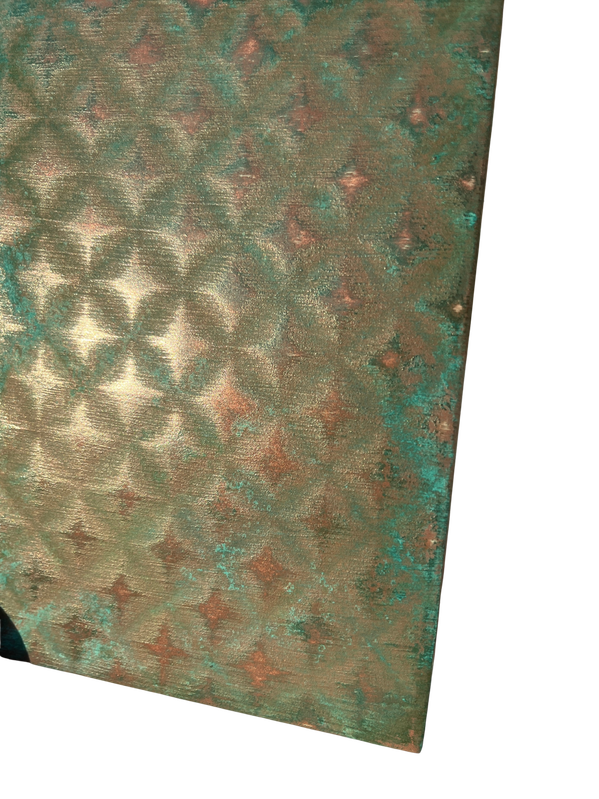 Diamond-textured liquid metal finish sample with patina detailing, bespoke finish technique
