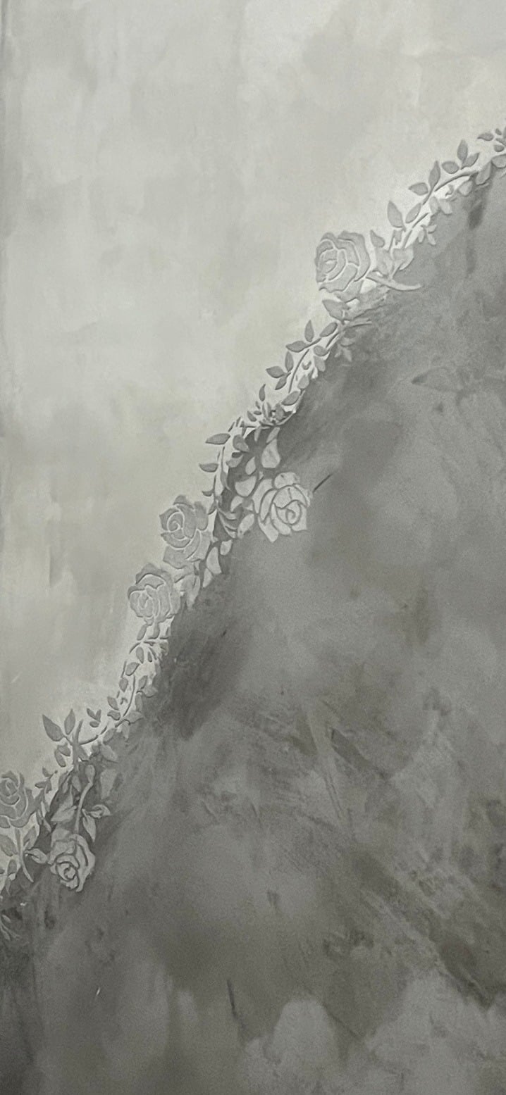Textured wall finish with diagonal decorative lace trim detail